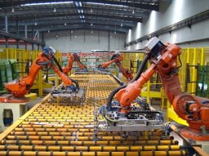 multiple crane machines in a factory